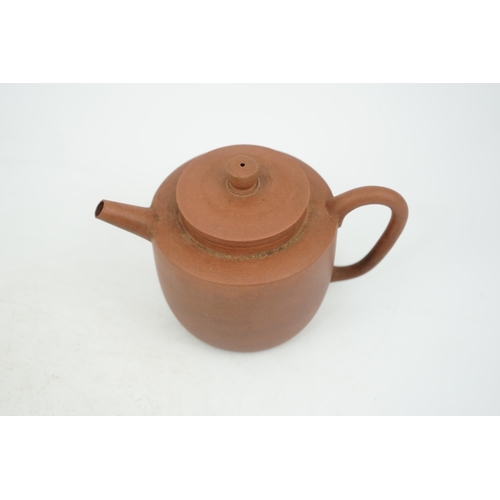 147 - A Chinese Yixing pottery teapot, 18th century, of cylindrical form with a slightly domed cover, inci... 