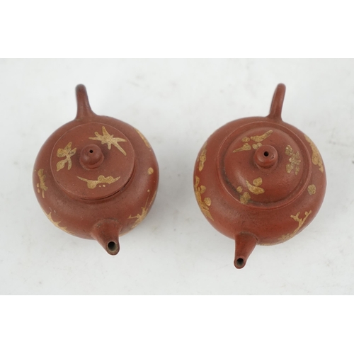 148 - Two Chinese Yixing slip-decorated miniature teapots and covers, 18th/19th century, each decorated in... 