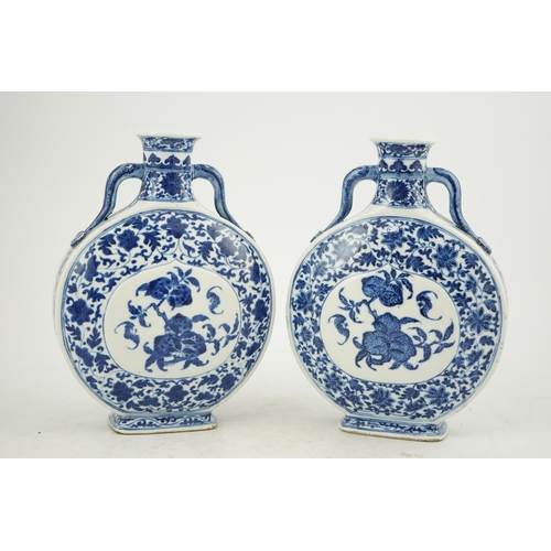 151 - A near pair of Chinese blue and white moonflasks, bianhu, Daoguang seal marks and of the period (182... 