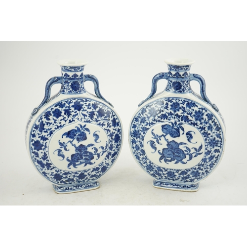 151 - A near pair of Chinese blue and white moonflasks, bianhu, Daoguang seal marks and of the period (182... 