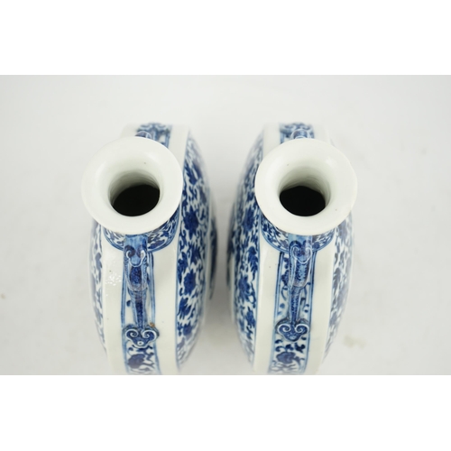 151 - A near pair of Chinese blue and white moonflasks, bianhu, Daoguang seal marks and of the period (182... 