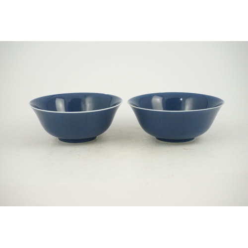 154 - A pair of Chinese powder blue glazed bowls, Daoguang mark and of the period (1821-50), each with a w... 