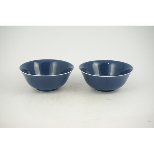 154 - A pair of Chinese powder blue glazed bowls, Daoguang mark and of the period (1821-50), each with a w... 