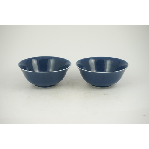 154 - A pair of Chinese powder blue glazed bowls, Daoguang mark and of the period (1821-50), each with a w... 