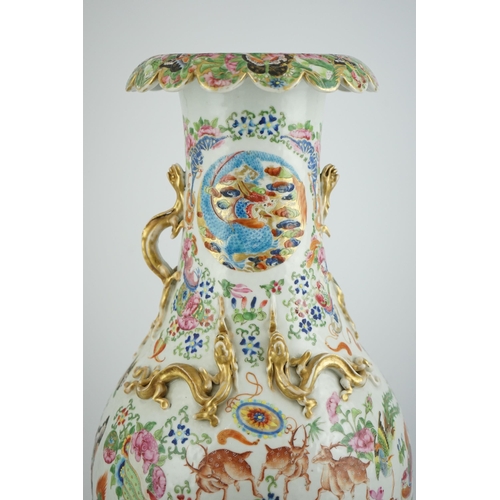 157 - A large Chinese famille rose beasts vase, mid 19th century, well painted with deer, tigers, butter... 