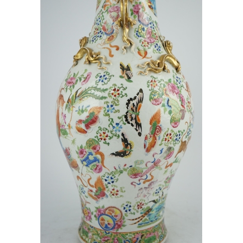 157 - A large Chinese famille rose beasts vase, mid 19th century, well painted with deer, tigers, butter... 