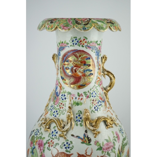 157 - A large Chinese famille rose beasts vase, mid 19th century, well painted with deer, tigers, butter... 