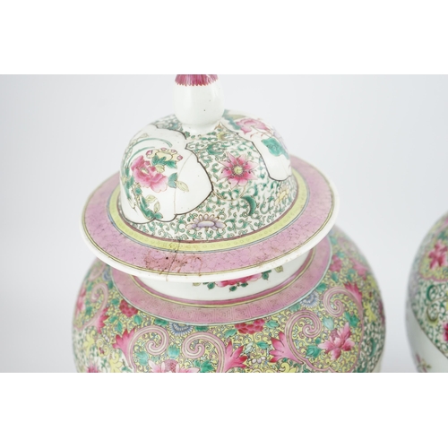 162 - A pair of large Chinese famille rose baluster jars and covers, Qianlong seal mark, but late 19th cen... 