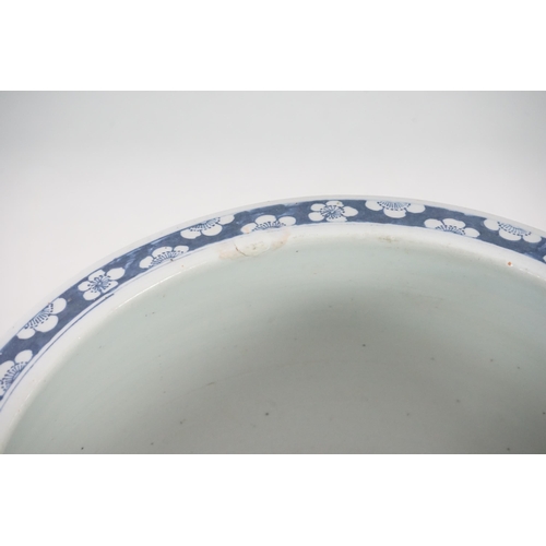 165 - A large Chinese blue and white Hundred Antiques jardinere and hongmu stand, late 19th/early 20th c... 