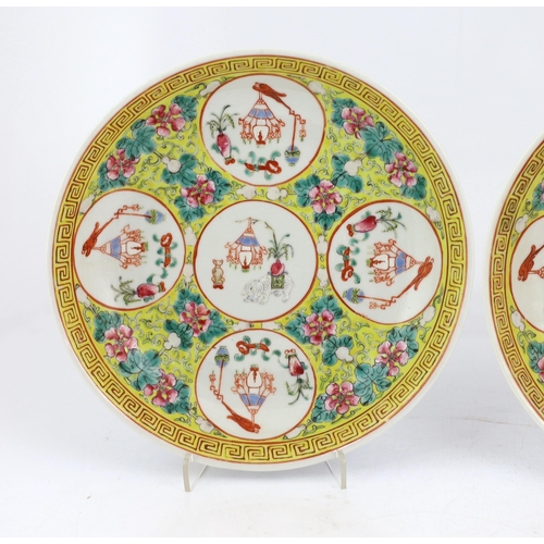 167 - A pair of Chinese yellow ground medallion saucer dishes, Guangxu six character marks, early 20th cen... 