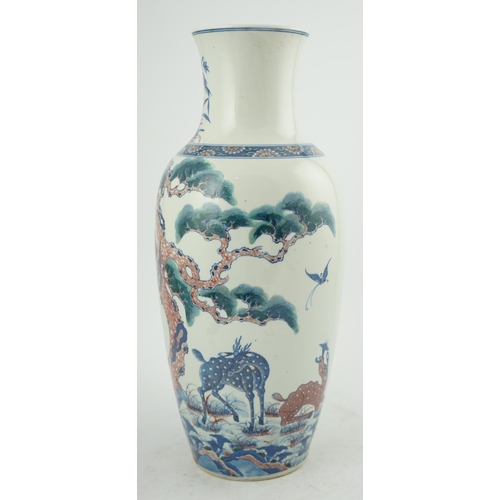 169 - An unusual Chinese underglaze blue and copper red longevity vase, 19th century, of elongated ovoid... 