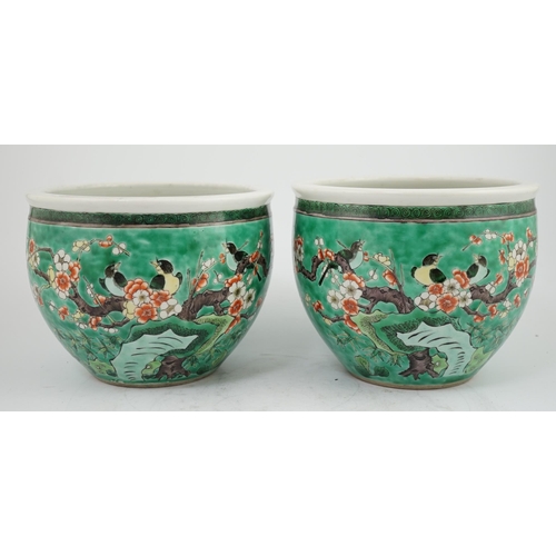 170 - A pair of Chinese famille verte green ground jardinieres, Kangxi marks, but late 19th century, each ... 