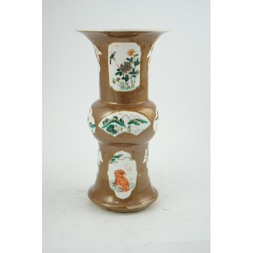 174 - A Chinese cafe-au-lait ground beaker vase, gu, 19th century, painted in famille verte palette with b... 