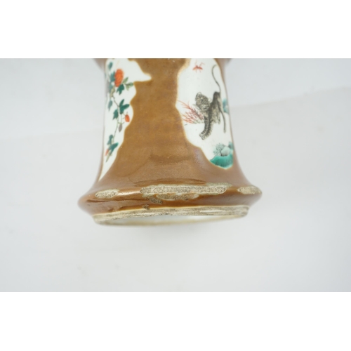 174 - A Chinese cafe-au-lait ground beaker vase, gu, 19th century, painted in famille verte palette with b... 