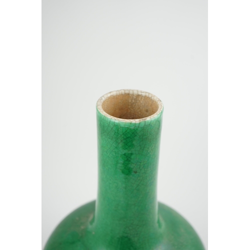 176 - A Chinese green crackle glazed bottle vase, 19th century, with white crackle glazed base, 41.5cm hig... 