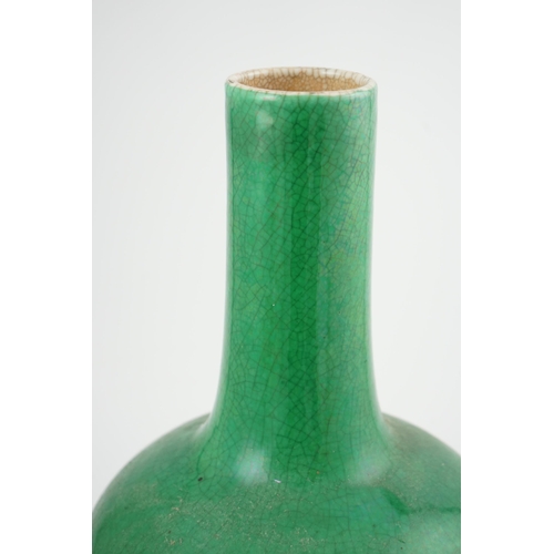 176 - A Chinese green crackle glazed bottle vase, 19th century, with white crackle glazed base, 41.5cm hig... 