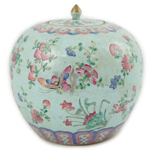 178 - A Chinese turquoise ground famille rose jar and cover, late 19th century, painted with butterflies a... 