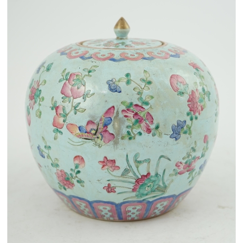 178 - A Chinese turquoise ground famille rose jar and cover, late 19th century, painted with butterflies a... 