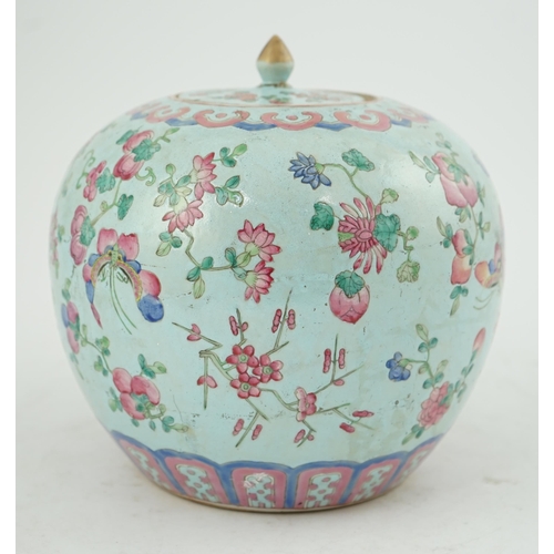 178 - A Chinese turquoise ground famille rose jar and cover, late 19th century, painted with butterflies a... 