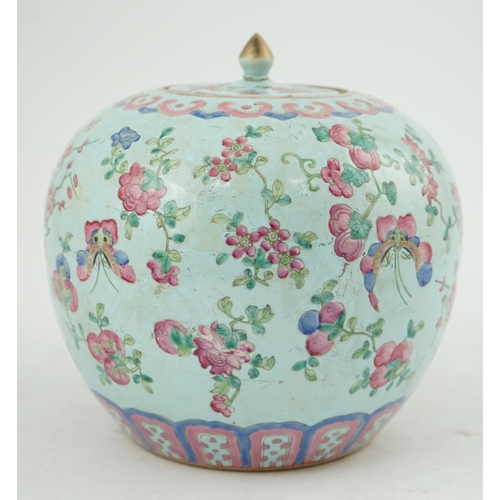 178 - A Chinese turquoise ground famille rose jar and cover, late 19th century, painted with butterflies a... 