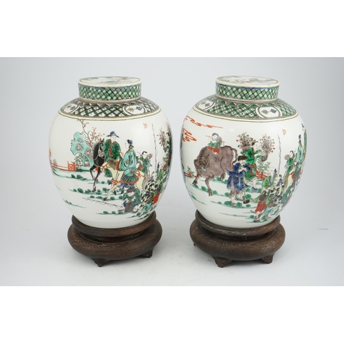 180 - A pair of large Chinese famille verte globular jars and covers, early 20th century, each painted wit... 