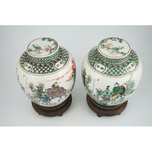 180 - A pair of large Chinese famille verte globular jars and covers, early 20th century, each painted wit... 