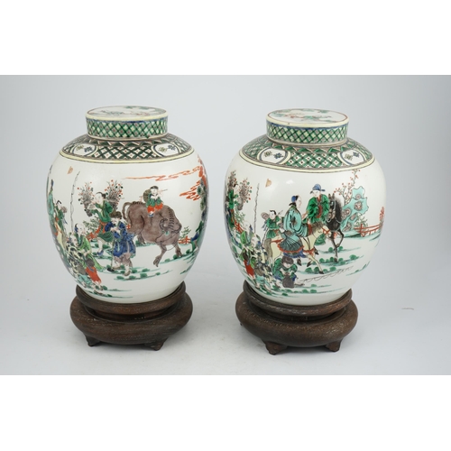 180 - A pair of large Chinese famille verte globular jars and covers, early 20th century, each painted wit... 