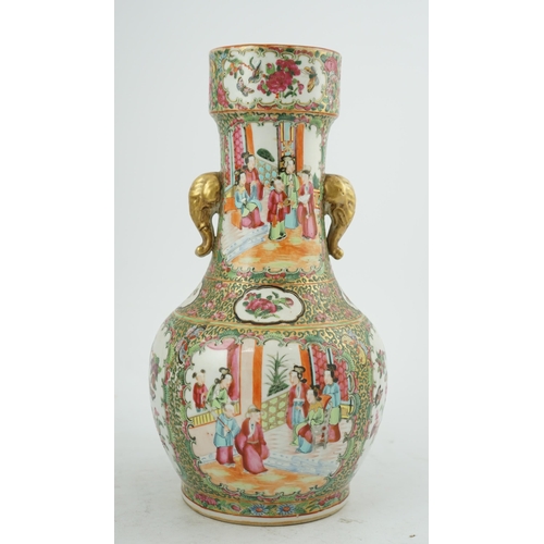 184 - A Chinese famille rose two handled vase, mid 19th century, of unusual shape, the cylindrical neck ap... 