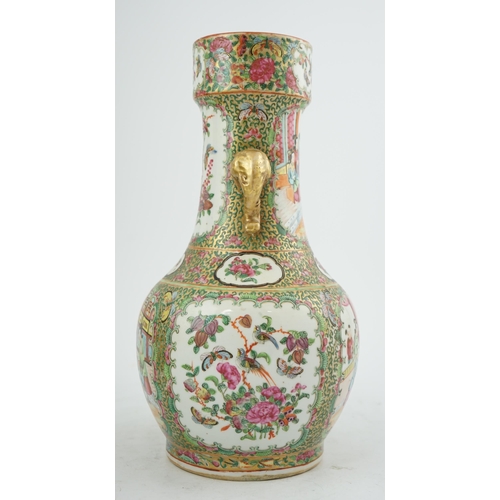 184 - A Chinese famille rose two handled vase, mid 19th century, of unusual shape, the cylindrical neck ap... 