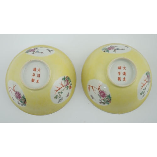 186 - A pair of Chinese yellow sgraffito ground medallion bowls, Guangxu mark, early 20th century, each ex... 