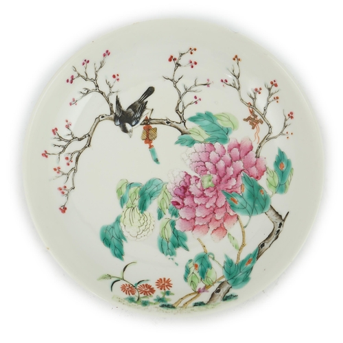 188 - A Chinese famille rose saucer dish, late 19th century, painted with a black bird perched in a blosso... 