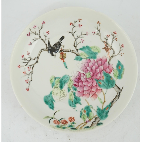 188 - A Chinese famille rose saucer dish, late 19th century, painted with a black bird perched in a blosso... 