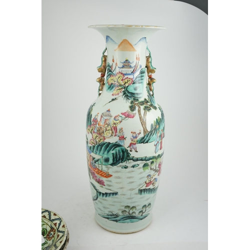 189 - An impressive Chinese famille rose baluster vase, 19th century, painted with dignitaries and attenda... 