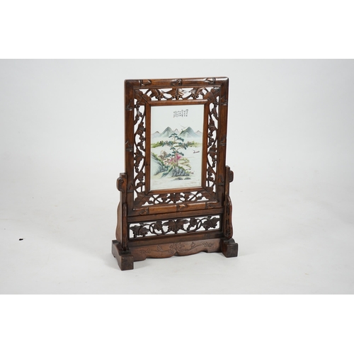 192 - A Chinese enamelled porcelain and hongmu framed table screen, Republic period, the rectangular porce... 