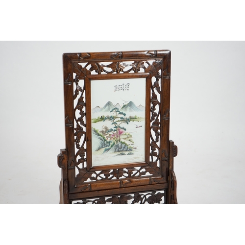 192 - A Chinese enamelled porcelain and hongmu framed table screen, Republic period, the rectangular porce... 