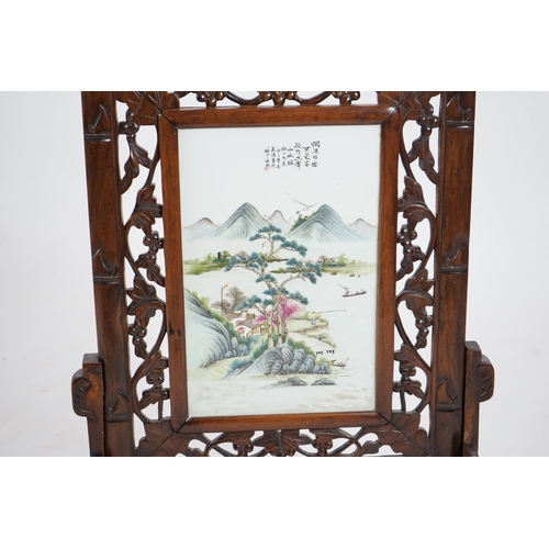 192 - A Chinese enamelled porcelain and hongmu framed table screen, Republic period, the rectangular porce... 