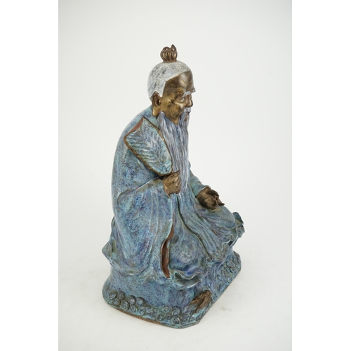 202 - An unusual large Chinese robins egg-glazed porcelain seated figure of Laozi, early 20th century, th... 