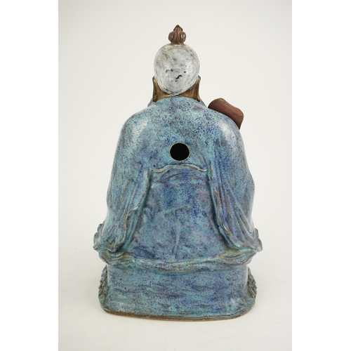 202 - An unusual large Chinese robins egg-glazed porcelain seated figure of Laozi, early 20th century, th... 