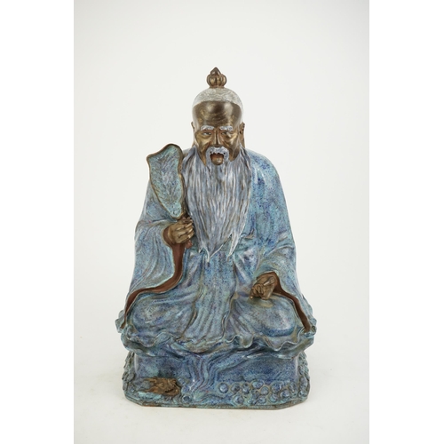 202 - An unusual large Chinese robins egg-glazed porcelain seated figure of Laozi, early 20th century, th... 