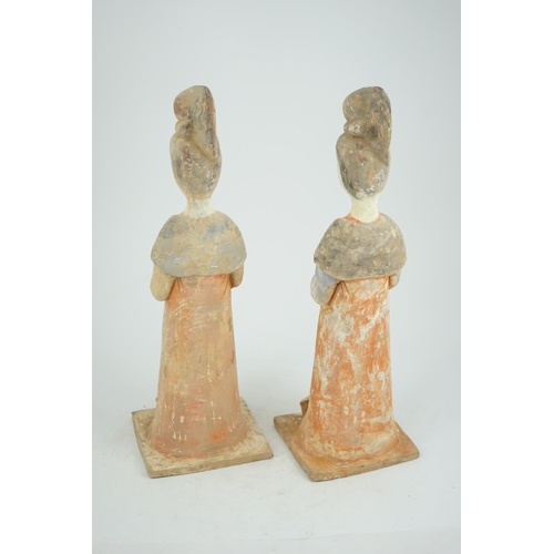 204 - A pair of Chinese Tang style painted pottery ladies, 44.5cm