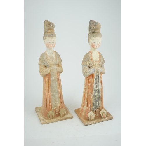 204 - A pair of Chinese Tang style painted pottery ladies, 44.5cm