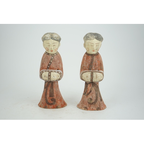 205 - A pair of Chinese Han style painted pottery ladies, 29.5cm