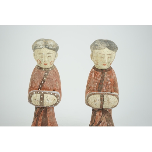 205 - A pair of Chinese Han style painted pottery ladies, 29.5cm