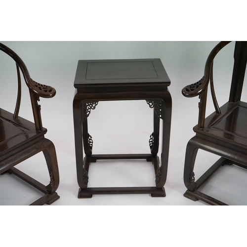 209 - A pair of Chinese jichimu horseshoe shaped armchairs and a matching table, 19th/20th century, all wi... 