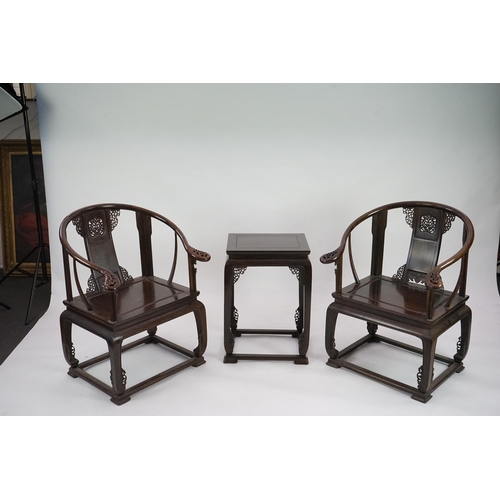 209 - A pair of Chinese jichimu horseshoe shaped armchairs and a matching table, 19th/20th century, all wi... 