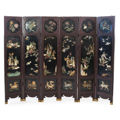 210 - A Chinese tixi lacquer and carved soapstone overlaid six panel screen, mid 20th century, relief deco... 