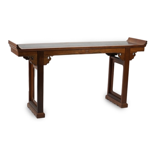 212 - A Chinese padouk wood and jichimu altar table, the panelled rectangular top with scroll ends, on pla... 