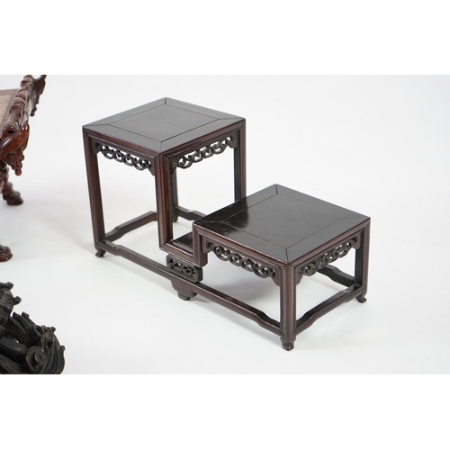 214 - Three Chinese carved wood stands, 19th/early 20th century the first a model of an altar table with m... 