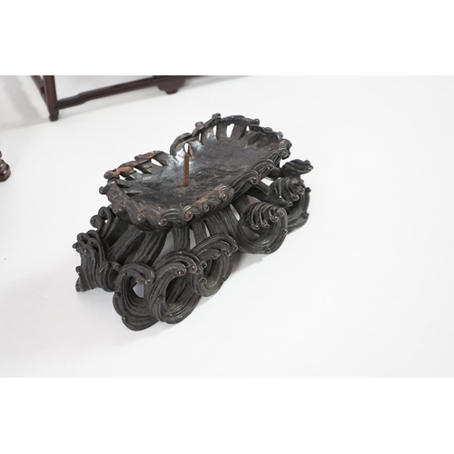 214 - Three Chinese carved wood stands, 19th/early 20th century the first a model of an altar table with m... 