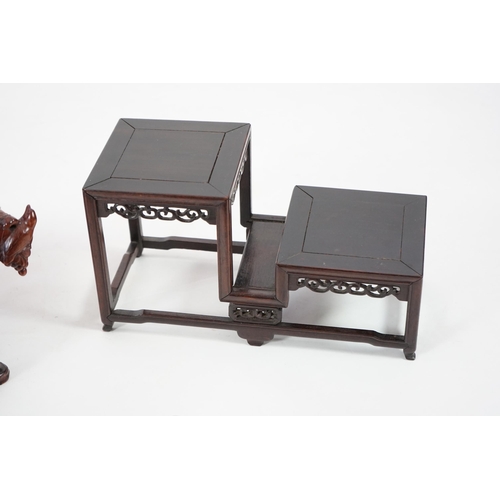 214 - Three Chinese carved wood stands, 19th/early 20th century the first a model of an altar table with m... 